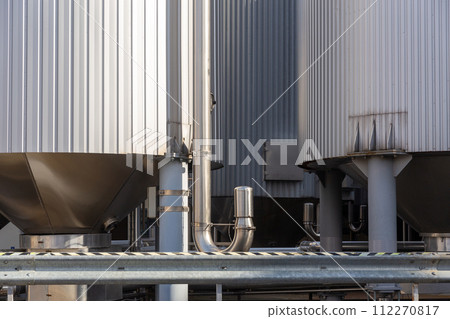 Brewery silos or tanks typically use for storing barley or fermented beer. 112270817