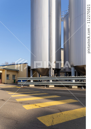 Brewery silos or tanks typically use for storing barley or fermented beer. 112270821