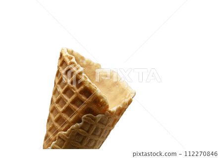 An empty waffle cone on a white background 112270846