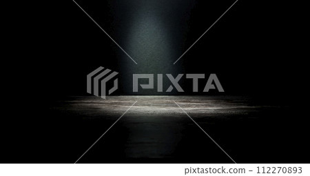 An empty dark stage with a light in the centre. An advertising concept for your product. 112270893
