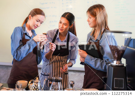Group young woman people leaning and education workshop for classes barista coffee in cafe room Group young woman people leaning and education workshop for classes barista coffee in cafe room 112275314