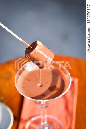 fondue,fonduta or chocolate fondue or chocolate fonduta and marshmallow 112276117