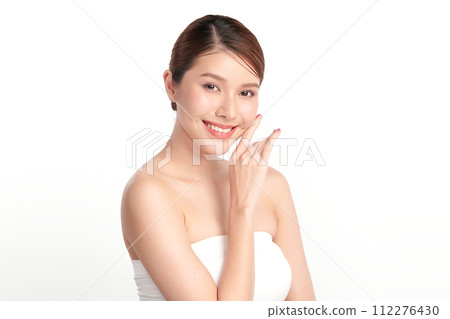 Beautiful young asian woman with clean fresh skin on white background, Face care, Facial treatment, Cosmetology, beauty and spa, Asian women portrait. Beautiful young asian woman with clean fresh skin on white background, Face care, Facial treatment, Cosmetology, beauty and spa, Asian women portrait. 112276430