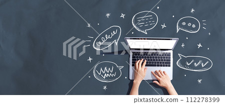 Speech bubbles and a laptop 112278399