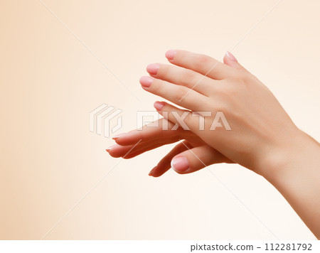 Beautiful Woman Hands. Female Hands Applying Cream Beautiful Woman Hands. Female Hands Applying Cream 112281792