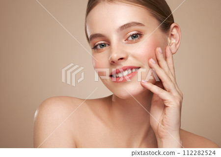 Portrait beautiful young woman with clean fresh skin Portrait beautiful young woman with clean fresh skin 112282524