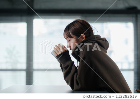 Woman cute morning coffee relaxing Woman cute morning coffee relaxing 112282619