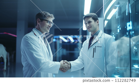 AI-generated content. Two scientists in lab coats sharing a handshake gesture in a science lab 112282749