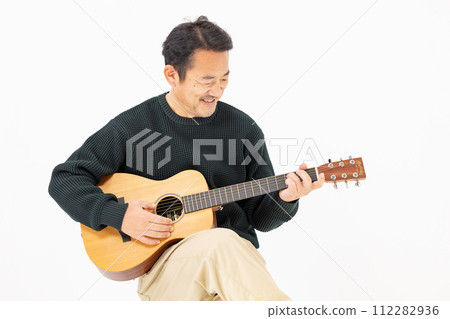 Man playing guitar, white background Man playing guitar, white background 112282936