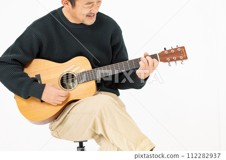 Man playing guitar, white background Man playing guitar, white background 112282937