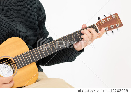 Man playing guitar, white background, hand Man playing guitar, white background, hand 112282939