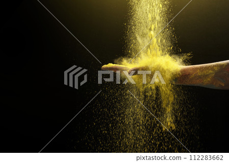 Human hand with colorful Holi powder Human hand with colorful Holi powder 112283662