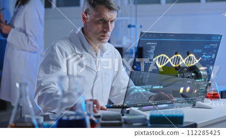 DNA lab scientist studying human genome structure on holographic screen, medical research 112285425
