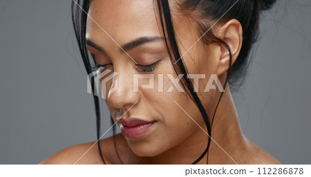 Face, skincare and beauty of happy woman in studio isolated on a gray background. Portrait, natural and smile of model in spa facial treatment for aesthetic, glow and cosmetic wellness for health Face, skincare and beauty of happy woman in studio isolated on a gray background. Portrait, natural and smile of model in spa facial treatment for aesthetic, glow and cosmetic wellness for health 112286878