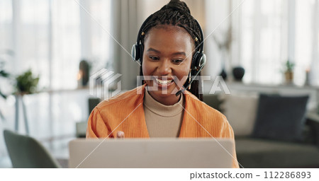 Black woman, webinar in home office with laptop and video call, remote work and crm in apartment. Virtual assistant at desk with computer, headset and conversation for advice, online chat and support Black woman, webinar in home office with laptop and video call, remote work and crm in apartment. Virtual assistant at desk with computer, headset and conversation for advice, online chat and support 112286893