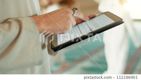 Religion, Islam and hands with a tablet at a mosque for communication, prayer or reading scripture. Research, website screen and a person scrolling on technology to study islamic faith online 112286901