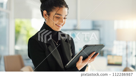 Happy businesswoman in office with tablet, email or social media for business feedback, schedule or agenda. Smile, digital app and woman networking online for market research, web review and report. Happy businesswoman in office with tablet, email or social media for business feedback, schedule or agenda. Smile, digital app and woman networking online for market research, web review and report. 112286987