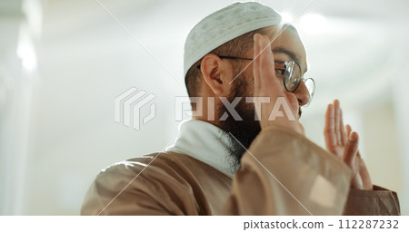 Islamic prayer, faith and man in mosque with gratitude, mindfulness and love for God or Allah. Worship, religion and Muslim imam praying for hope in holy temple praise, spiritual teaching and peace. 112287232