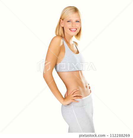 Happy, fitness and portrait of woman on a white background for wellness, lose weight and healthy body. Smile, sports and isolated person in sportswear for training, exercise and workout in studio 112288269