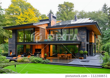 Large modern house has many windows and green lawn. Generative AI Large modern house has many windows and green lawn. Generative AI 112288651