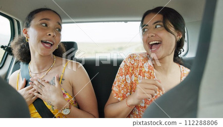 Woman, friends and singing on road trip, car and dancing with smile, sound and radio on holiday. Girl, dancer and happy with singalong, karaoke and carpool with driving, noise and listening to music 112288806