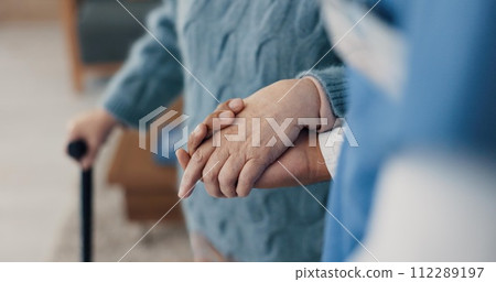Holding hands, help with elderly person and caregiver in nursing home, kindness and senior care for health. Retirement, pension and patient with disability, nurse for assistance and homecare closeup Holding hands, help with elderly person and caregiver in nursing home, kindness and senior care for health. Retirement, pension and patient with disability, nurse for assistance and homecare closeup 112289197