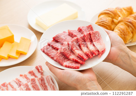 Foods high in fat and in women's hands 112291287