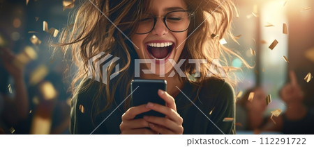 AI-generated content. This young, happy woman, who won online, is holding her phone. She is feeling excited and is celebrating early success by receiving great news by sms or receiving a new job by AI-generated content. This young, happy woman, who won online, is holding her phone. She is feeling excited and is celebrating early success by receiving great news by sms or receiving a new job by 112291722
