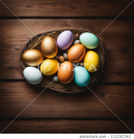 Easter eggs with flower on wood table background. 112292342