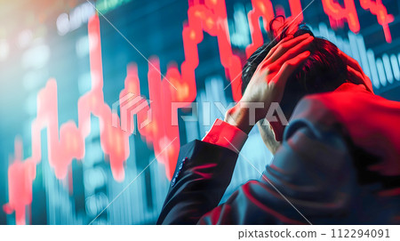 Businessman in a Somber Mood During Market Crash Businessman in a Somber Mood During Market Crash 112294091