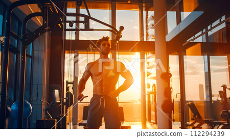Man Exercising in Modern Gym 112294239