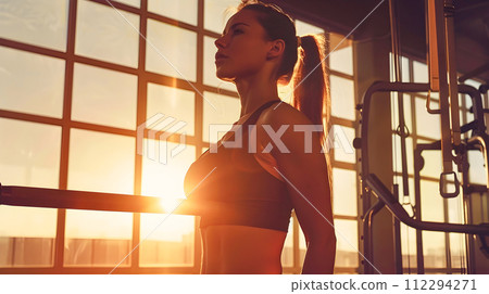 Woman Exercising in a Modern Gym 112294271