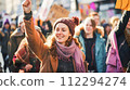 Woman Holding Protest Sign in the Style of Light Amber and Violet 112294274