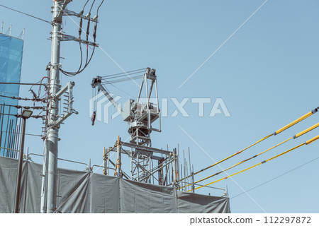 small crane at construction site 112297872