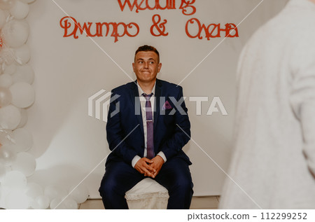 groom the husband sits and waits for the bride 112299252