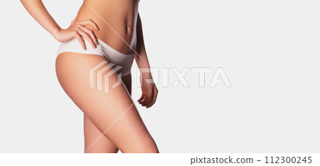 Perfect body. Slim caucasian lady posing with Perfect body. Slim caucasian lady posing with 112300245