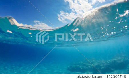 Blue sea and sea surface seen from underwater (AI generated image) Blue sea and sea surface seen from underwater (AI generated image) 112300748