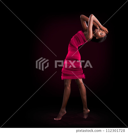 Portrait, fashion and art of dance with black woman in studio on dark background for performance. Creative, music and movement with confident young person dancing or moving in rhythm for concert 112301728