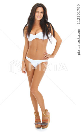 Woman, bikini and fashion for studio portrait with shoes, confidence and smile by white background. Girl, person and happy model with high heels for swimsuit for holiday with trendy style in Italy Woman, bikini and fashion for studio portrait with shoes, confidence and smile by white background. Girl, person and happy model with high heels for swimsuit for holiday with trendy style in Italy 112301799