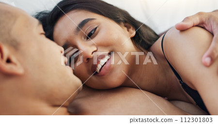 Couple, hug and loving conversation in bed on sunday morning, bonding and hugging on weekend. People, embrace and communication in relationship at home, kiss and resting or greeting for waking up Couple, hug and loving conversation in bed on sunday morning, bonding and hugging on weekend. People, embrace and communication in relationship at home, kiss and resting or greeting for waking up 112301803
