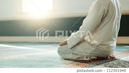 Praying, Muslim and man with faith in a mosque for praying, peace and spiritual care in holy religion for Allah. Respect, Ramadan and Islamic person with kindness, hope and humble after worship 112301940