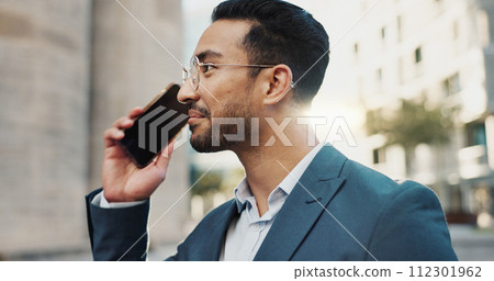 Asian businessman, phone call or happy by buildings in city, office view or talking by workplace in professional career. Young lawyer, chat or smartphone in connection or communication in cbd in town 112301962