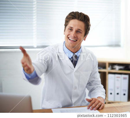 Handshake, smile and man doctor in office for greeting hello at a medical consultation at clinic. Happy, professional and young male healthcare worker with shaking hand gesture in a medicare hospital Handshake, smile and man doctor in office for greeting hello at a medical consultation at clinic. Happy, professional and young male healthcare worker with shaking hand gesture in a medicare hospital 112301985