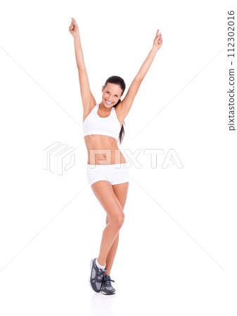 Woman, excited and portrait with sportswear in studio for workout, athletic and active for healthy slim body. Female person, celebrating and wellness for fit figure with win on a white background Woman, excited and portrait with sportswear in studio for workout, athletic and active for healthy slim body. Female person, celebrating and wellness for fit figure with win on a white background 112302016