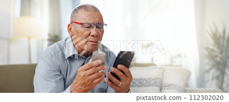 Phone, medicine and senior man with home research, reading label and learning of telehealth services. Online patient with pills bottle, tablet and mobile for information or health benefits on a sofa Phone, medicine and senior man with home research, reading label and learning of telehealth services. Online patient with pills bottle, tablet and mobile for information or health benefits on a sofa 112302020
