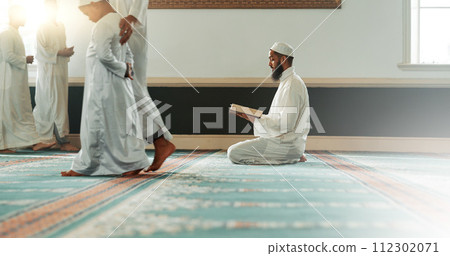 Quran, islamic and man reading for faith in a mosque for praying, peace and spiritual care in holy religion for Allah. Respect, Ramadan and Muslim person with kindness, hope and humble after worship Quran, islamic and man reading for faith in a mosque for praying, peace and spiritual care in holy religion for Allah. Respect, Ramadan and Muslim person with kindness, hope and humble after worship 112302071