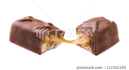 Chocolate bar with caramel and nuts broken in half flies close-up on a white background. Isolated Chocolate bar with caramel and nuts broken in half flies close-up on a white background. Isolated 112302100