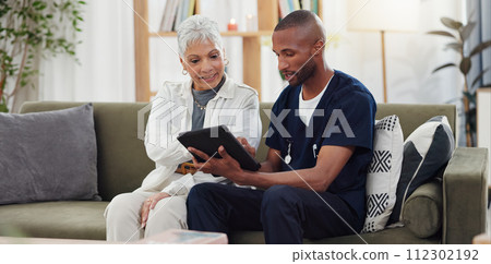 Old woman, man and tablet, caregiver with patient for healthcare and medical information or help with social media. Support, African nurse for elderly care and tech, telehealth and how to work app Old woman, man and tablet, caregiver with patient for healthcare and medical information or help with social media. Support, African nurse for elderly care and tech, telehealth and how to work app 112302192