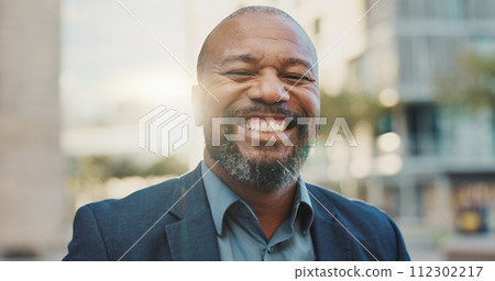 Face, business and laughing black man in city outdoor in the morning on lens flare. Portrait, happy and professional lawyer in town, attorney and funny employee working in South Africa for career Face, business and laughing black man in city outdoor in the morning on lens flare. Portrait, happy and professional lawyer in town, attorney and funny employee working in South Africa for career 112302217