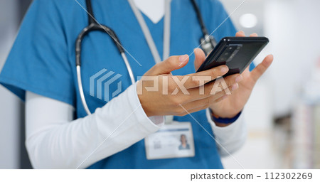 Hands, phone and healthcare with a nurse scrolling in a hospital closeup for research or networking. Medical, communication and information with a medicine professional reading a text in a clinic 112302269